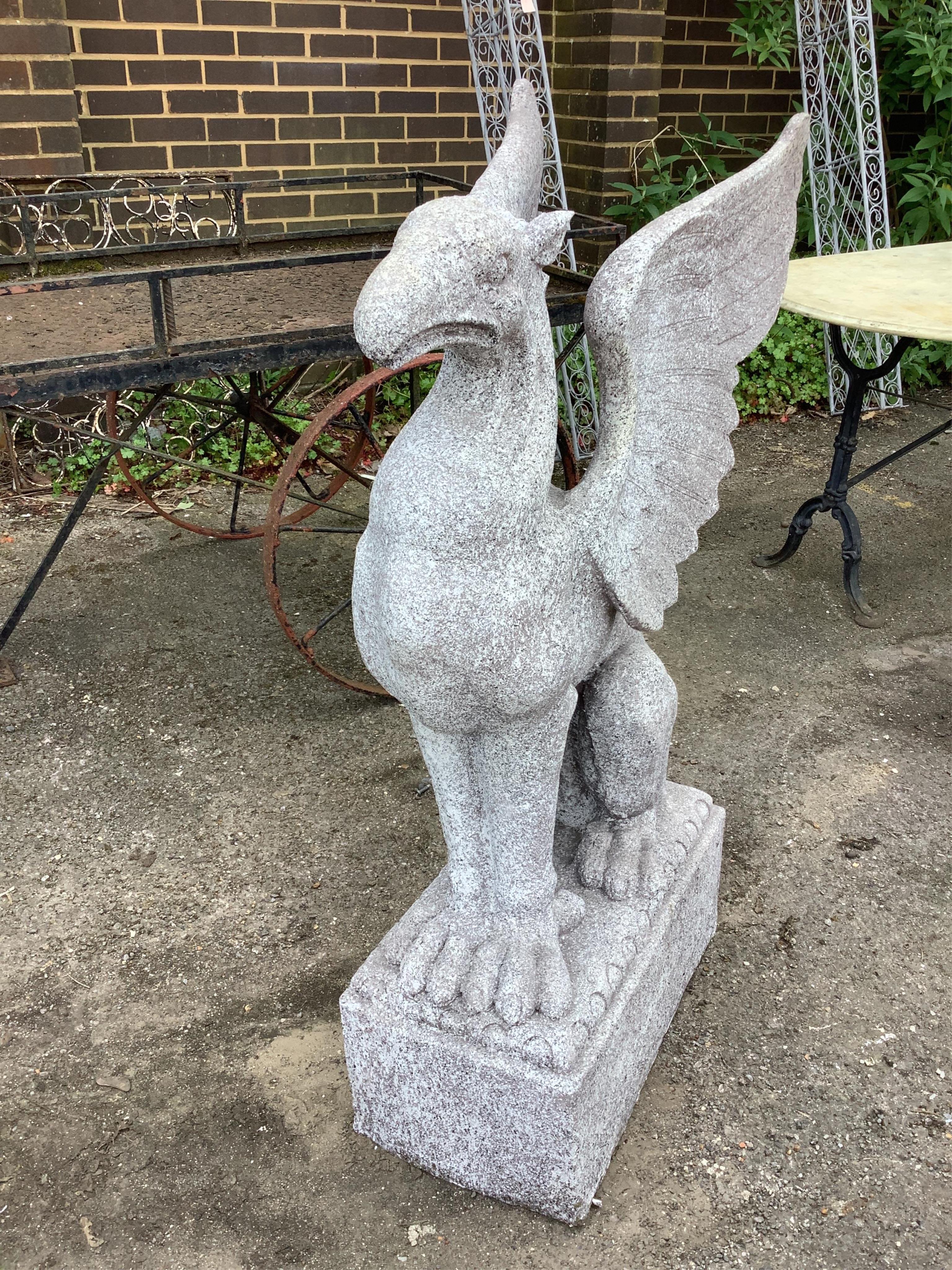 A Fibreclay griffon garden ornament, height 108cm